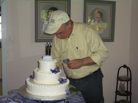 Finishing touches on cake